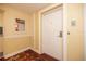 Hallway entrance features unit number 613, fire extinguisher, and decorative carpet at 4900 Brittany S Dr # 613, St Petersburg, FL 33715
