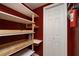 Pantry with shelving, cabinets, and a fire extinguisher at 4900 Brittany S Dr # 613, St Petersburg, FL 33715