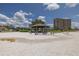 Large pavilion with picnic tables and benches is adjacent to a waterfront park at 4900 Brittany S Dr # 613, St Petersburg, FL 33715