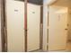 This image showcases storage lockers with a simple latch mechanism, offering practical solutions for secure personal item safekeeping at 4900 Brittany S Dr # 613, St Petersburg, FL 33715