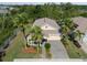Beautiful single-Gathering home with a landscaped front yard and charming front porch at 5102 Coastal Scene Dr, Apollo Beach, FL 33572