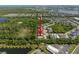 A beautiful aerial view of a single-Gathering home and its location near a preserve at 5102 Coastal Scene Dr, Apollo Beach, FL 33572