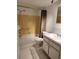 A full bathroom features a shower-tub combination, toilet, and vanity sink at 5155 9Th N Ave # 206 B, St Petersburg, FL 33710