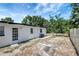Spacious backyard with white house at 6014 S 82Nd St, Tampa, FL 33619