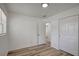 Bedroom with wood-look flooring and a closet is bright and airy at 6014 S 82Nd St, Tampa, FL 33619
