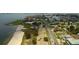 Aerial view of a beachfront community with nearby houses, parks, and waterfront access at 6060 Shore S Blvd # 903, Gulfport, FL 33707