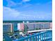 Scenic aerial view of condominium buildings, parking area, and ocean at 6060 Shore S Blvd # 903, Gulfport, FL 33707