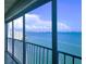 Beautiful balcony view showcasing the water, boats, and the coastline at 6060 Shore S Blvd # 903, Gulfport, FL 33707