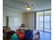 Bedroom features slider access to a balcony and scenic water views at 6060 Shore S Blvd # 903, Gulfport, FL 33707