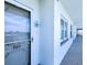 Condo front door with beautiful view of the city and ocean in the background at 6060 Shore S Blvd # 903, Gulfport, FL 33707