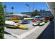 Various colorful kayaks are available for use in this waterfront community at 6060 Shore S Blvd # 903, Gulfport, FL 33707