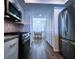Bright kitchen with stainless steel refrigerator, and matching oven at 6060 Shore S Blvd # 903, Gulfport, FL 33707