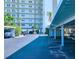 Condominium covered parking area with glimpse of the ocean at 6060 Shore S Blvd # 903, Gulfport, FL 33707