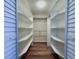 Walk-in closet with ample shelving space at 6060 Shore S Blvd # 903, Gulfport, FL 33707