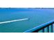 Breathtaking water view from a high-rise features a boat speeding along the water at 6060 Shore S Blvd # 903, Gulfport, FL 33707