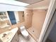 Bathroom with a toilet, sink, and walk-in shower at 613 Sandy Hollow Rd, Tarpon Springs, FL 34689