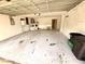Attached garage featuring the washer, dryer, overhead lighting, and plenty of space at 613 Sandy Hollow Rd, Tarpon Springs, FL 34689