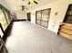 Screened lanai provides a relaxing retreat with views of the backyard at 613 Sandy Hollow Rd, Tarpon Springs, FL 34689