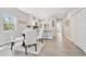 Bright dining room with hardwood floors at 6433 Werner Ave, New Port Richey, FL 34652