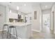 Modern kitchen with a quartz countertop island, modern cabinets, and stainless steel appliances at 6433 Werner Ave, New Port Richey, FL 34652