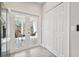 Easy access to the patio through French doors, complete with tiled flooring and closet at 6433 Werner Ave, New Port Richey, FL 34652
