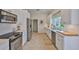 Clean and bright kitchen featuring stainless steel appliances, subway tile backsplash, and ample counter space at 6468 Rubia Cir, Apollo Beach, FL 33572