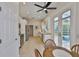 Bright kitchen with stainless appliances, white cabinetry, and breakfast nook overlooking the pool at 6468 Rubia Cir, Apollo Beach, FL 33572