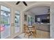 Inviting living area adjacent to the pool patio with white trim and neutral colors at 6468 Rubia Cir, Apollo Beach, FL 33572