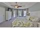 Spacious main bedroom featuring a tray ceiling, neutral walls, and plenty of natural light at 6468 Rubia Cir, Apollo Beach, FL 33572