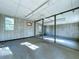 Unfinished basement with windows and concrete floors at 6602 Winding Brook Dr, New Port Richey, FL 34655