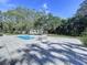 Enjoy outdoor living with this private pool and surrounding patio, perfect for relaxation and entertaining at 6602 Winding Brook Dr, New Port Richey, FL 34655