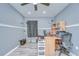 Bedroom featuring light gray walls, wood-look floors, white trim, and a ceiling fan at 6628 Summer Haven Dr, Riverview, FL 33578