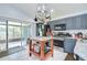 Stylish kitchen with dark cabinets, stainless steel appliances, and an island for food preparation at 6628 Summer Haven Dr, Riverview, FL 33578