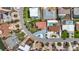 Overhead view of the property showing landscaping, driveway, and proximity to other homes in neighborhood at 7125 S Shore S Dr, St Petersburg, FL 33707