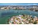 Wide aerial shot capturing a coastal city with a bay full of boats and houses lining the waterfront at 7125 S Shore S Dr, St Petersburg, FL 33707