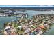 Expansive aerial view showcasing the waterside community with stunning waterfront access at 7125 S Shore S Dr, St Petersburg, FL 33707