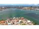 Scenic aerial view of waterfront homes, highlighting their prime location and beautiful bay access at 7125 S Shore S Dr, St Petersburg, FL 33707