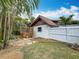 Charming backyard featuring a private hot tub, lush greenery, and a serene, secluded atmosphere at 7125 S Shore S Dr, St Petersburg, FL 33707