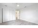Spacious bedroom with a ceiling fan and natural light at 7125 S Shore S Dr, St Petersburg, FL 33707