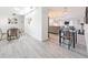 Open living space with dining area, kitchen and seating at 7125 S Shore S Dr, St Petersburg, FL 33707