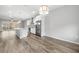 Bright, open kitchen featuring stainless steel appliances, granite countertops, and seamless access to the balcony at 807 Callista Cay Loop, Tarpon Springs, FL 34689