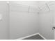 Well-organized walk-in closet with wire shelves, maximizing space for storage at 807 Callista Cay Loop, Tarpon Springs, FL 34689