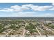 Well-maintained neighborhood with mature trees providing shade and a sense of privacy at 953 Tropical Nw Ave, Port Charlotte, FL 33948