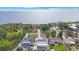 Stunning aerial view of waterfront homes showcasing their lush landscaping at 965 S Florida Ave, Tarpon Springs, FL 34689