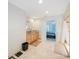 Well-lit bathroom featuring a vanity with granite countertop and a walk-in shower at 965 S Florida Ave, Tarpon Springs, FL 34689