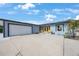 Beautiful home featuring a spacious driveway and a well-maintained exterior at 965 S Florida Ave, Tarpon Springs, FL 34689