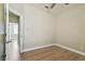 This is an empty bedroom with a door opening to another room at 9709 Bay Colony Dr, Riverview, FL 33578