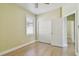 This is an empty bedroom that has a closet at 9709 Bay Colony Dr, Riverview, FL 33578