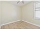 A small, empty, bedroom is shown at 9709 Bay Colony Dr, Riverview, FL 33578