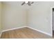 This is an empty bedroom that has a light green walls and a ceiling fan at 9709 Bay Colony Dr, Riverview, FL 33578